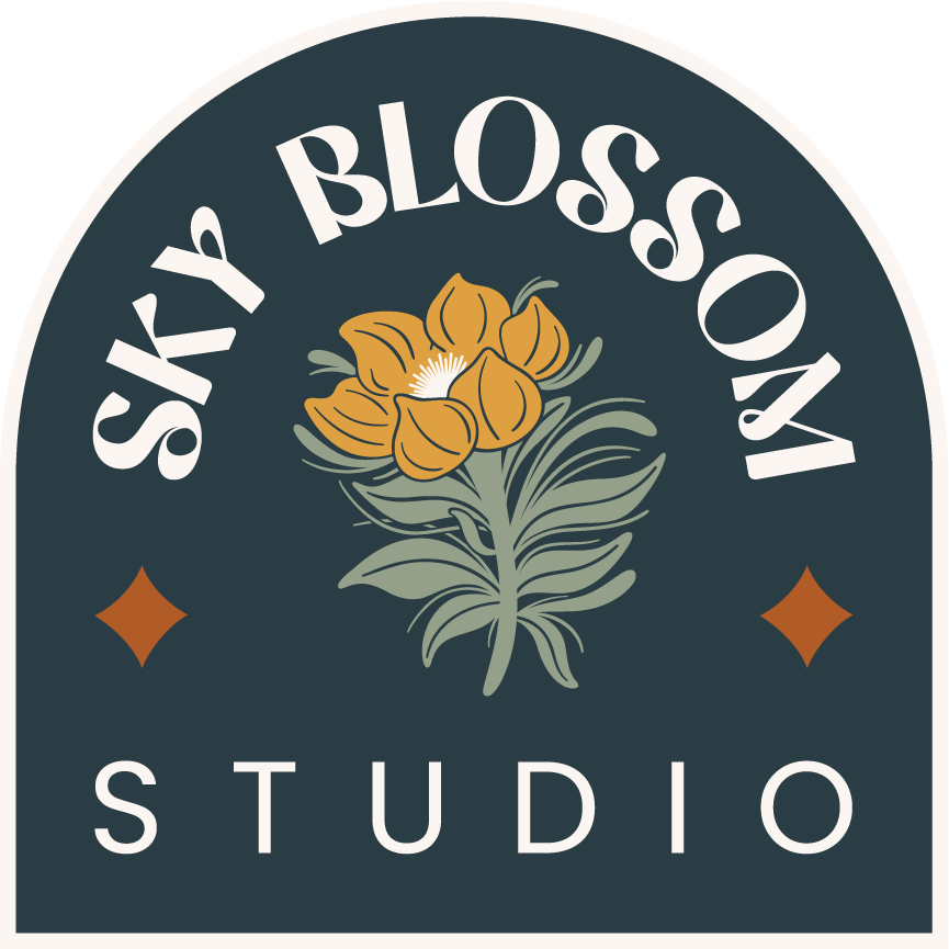 The logo for Sky Blossom Studio .