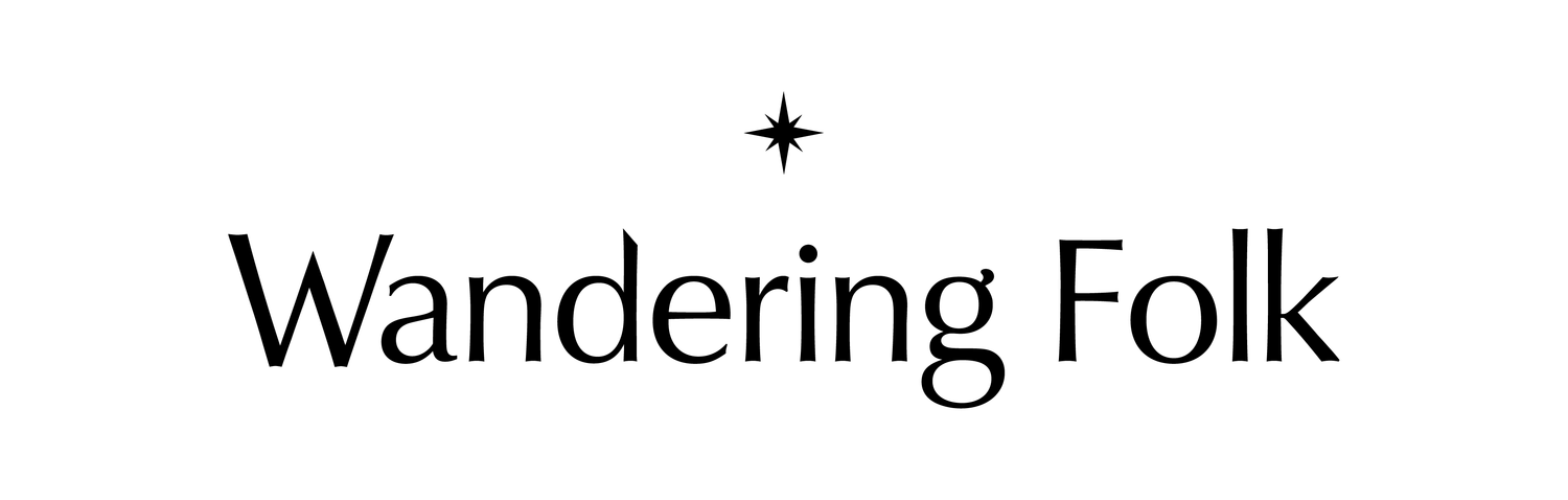 The logo for Wandering Folk.