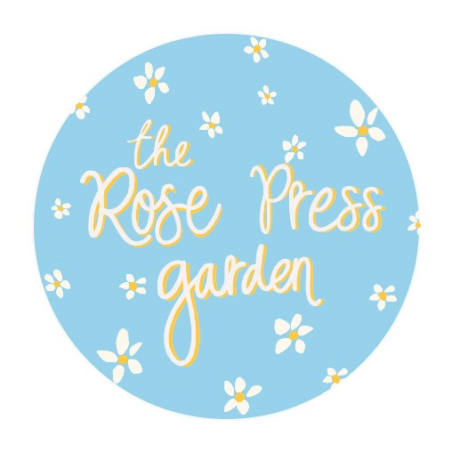 The logo for The Rose Press Garden.