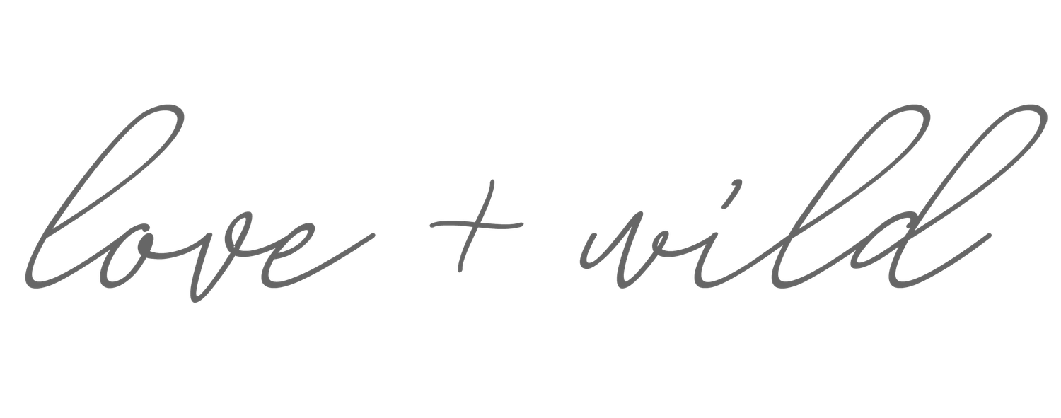 The logo for love + wild.